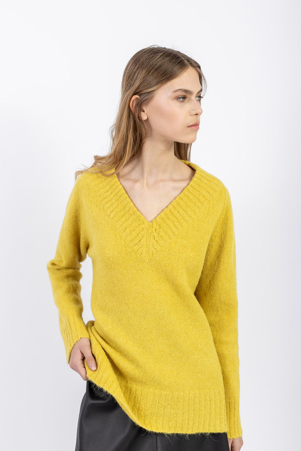 Women's yellow knit sweater in alpaca wool blend, straight cut, front view