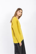 Oversized V-neck pullover in soft yellow, handcrafted alpaca blend knitwear