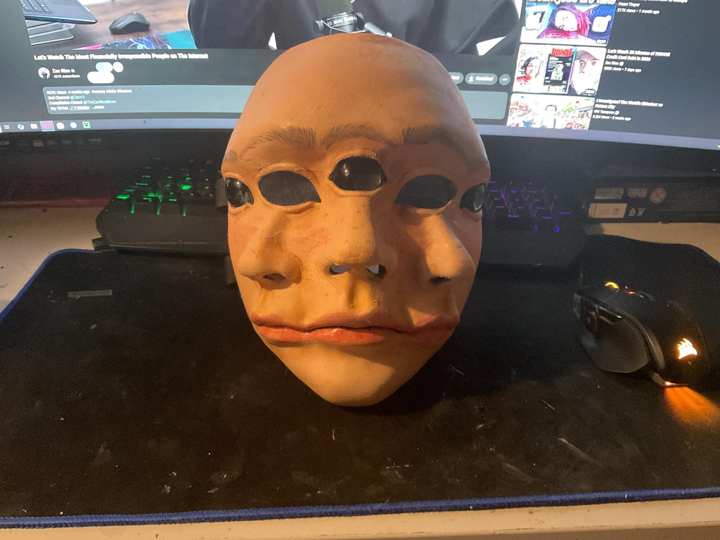 3D printed cosplay mask Backrooms Still Life design with glass eye details