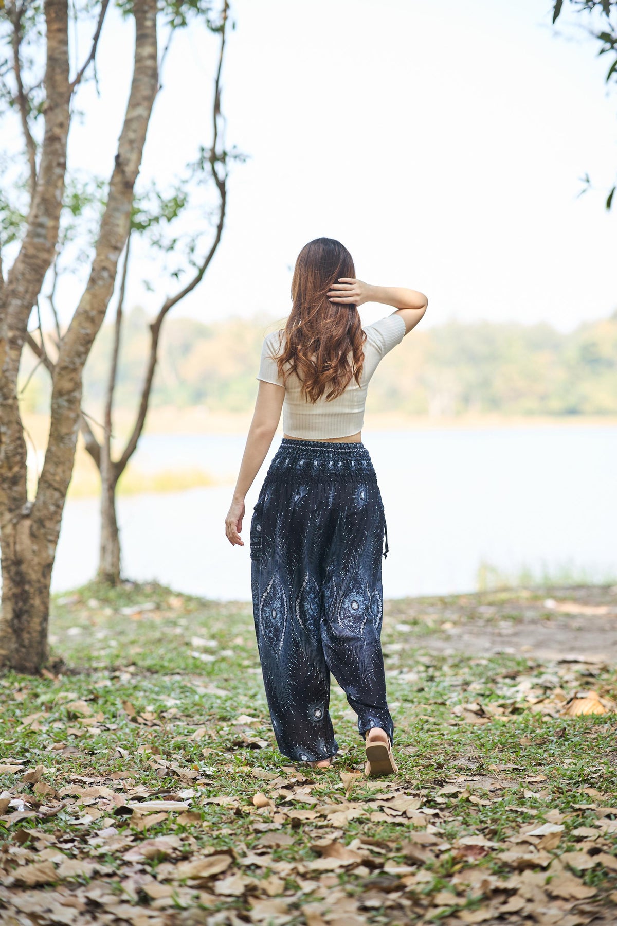 Women's black harem pants with elastic ankles for yoga and lounging