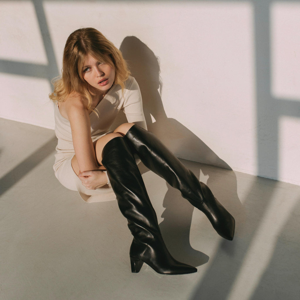 Women's black Italian leather knee high boots with low slim heel