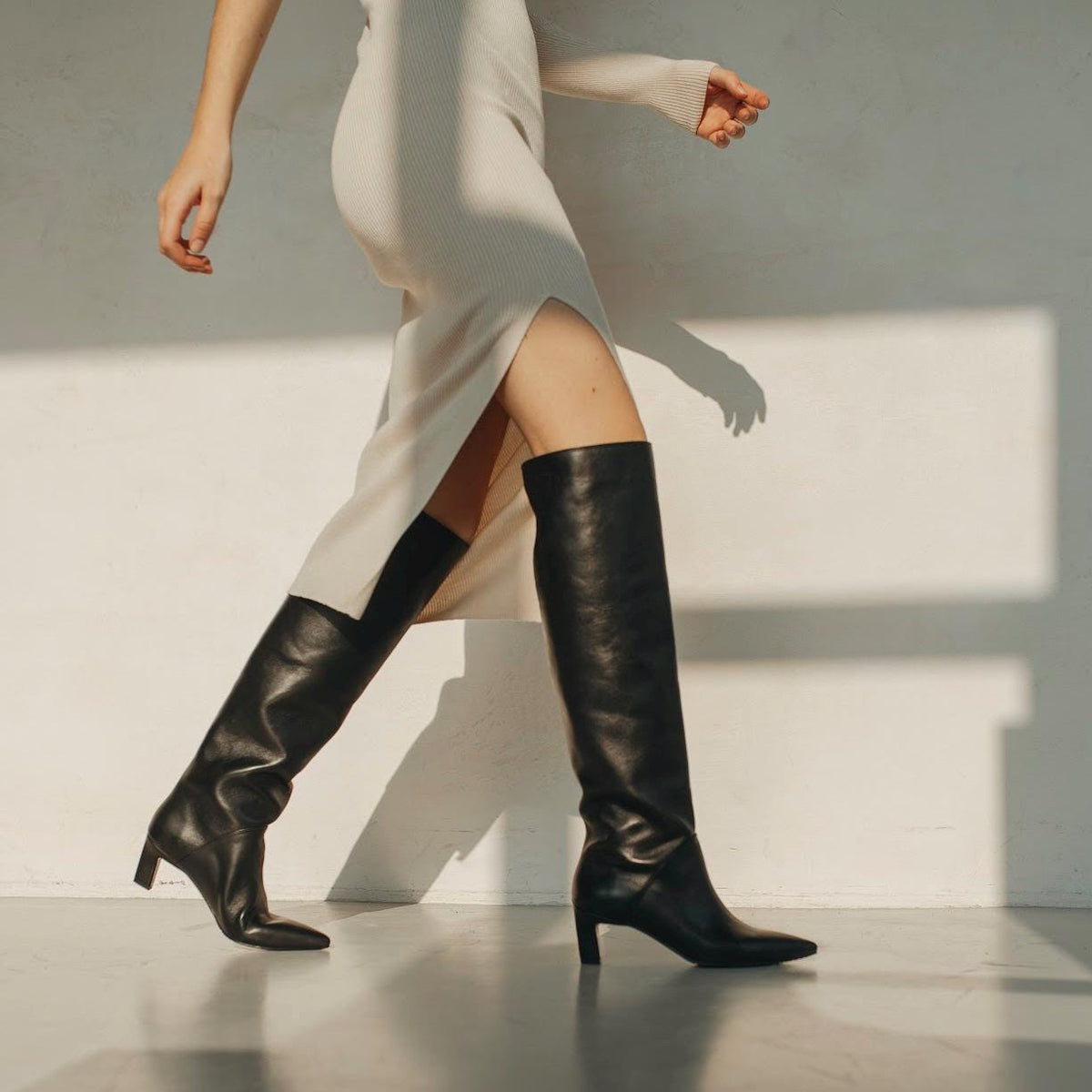 Pointy toe black leather boots for women with wide calf fit