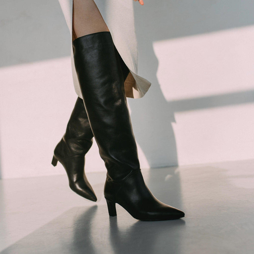 Custom black leather boots with kitten heel and pointy toe