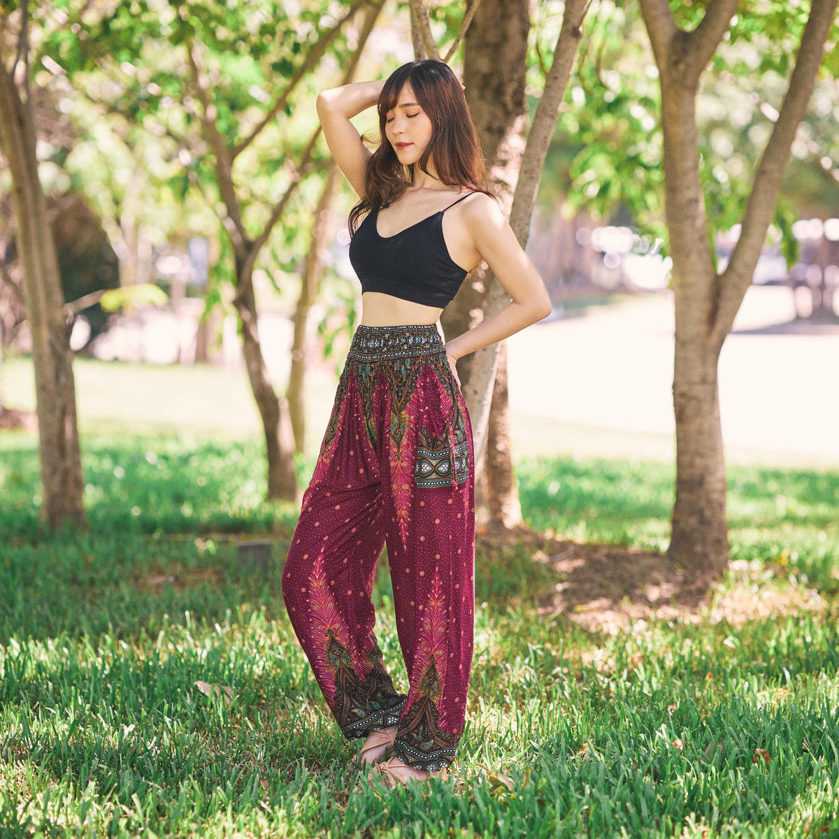 Adult Halloween costume pants with peacock motif