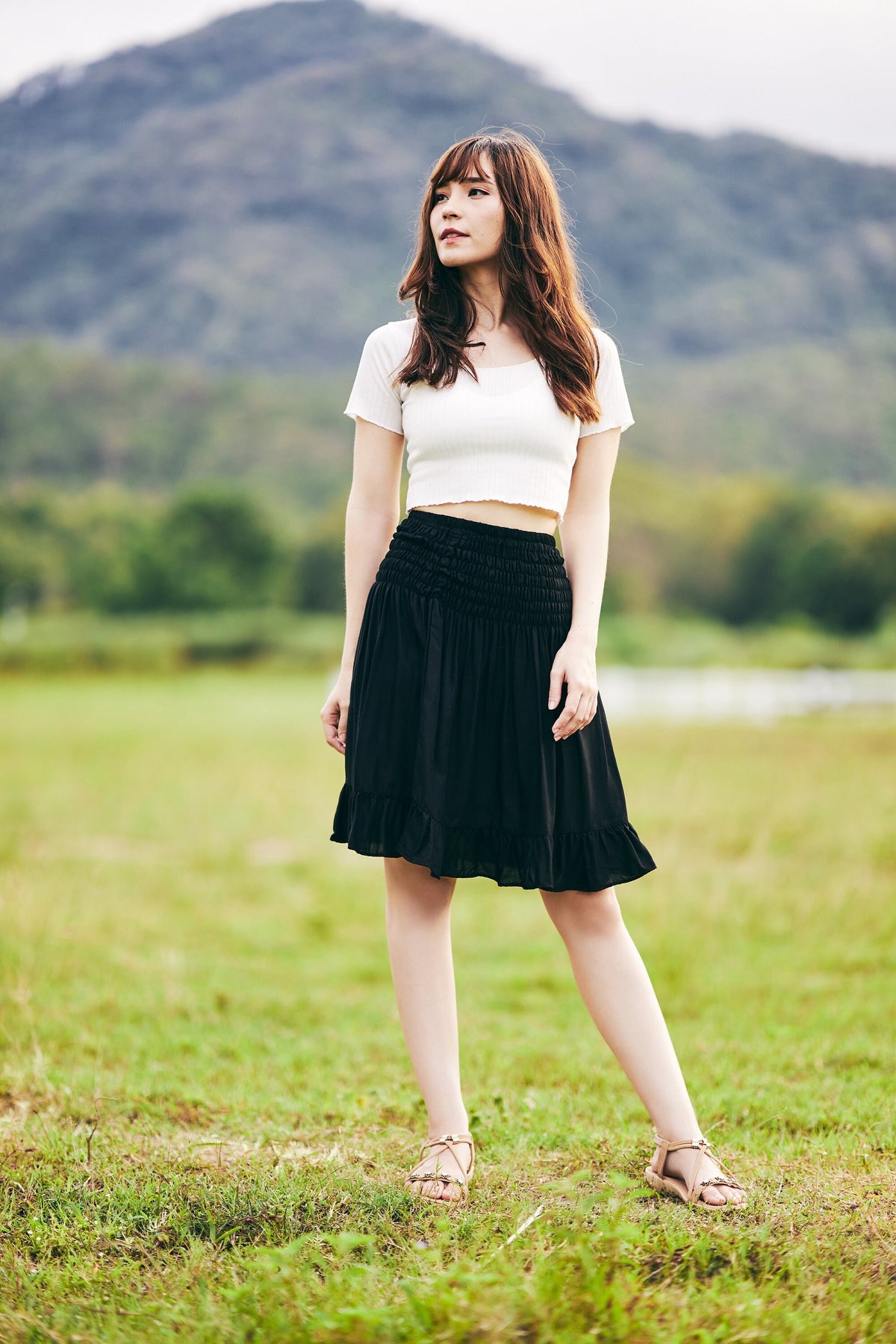 Black skater skirt for women with flowy mini silhouette and high waist