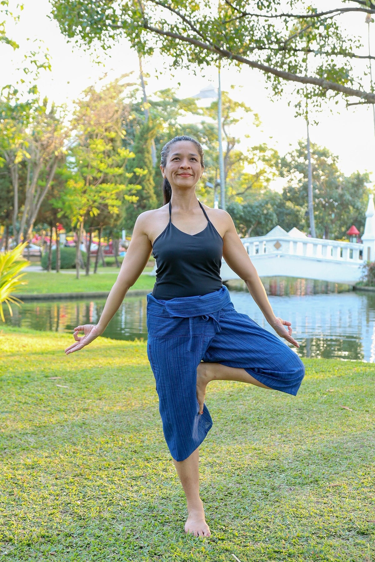 Blue Thai fisherman pants for women with wide adjustable waist and 3/4 length