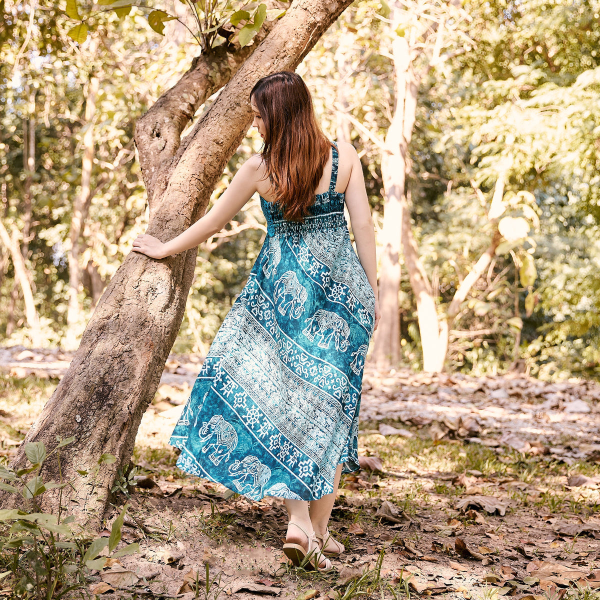 Handmade boho summer dress with smocked chest and elephant print, wedding guest outfit