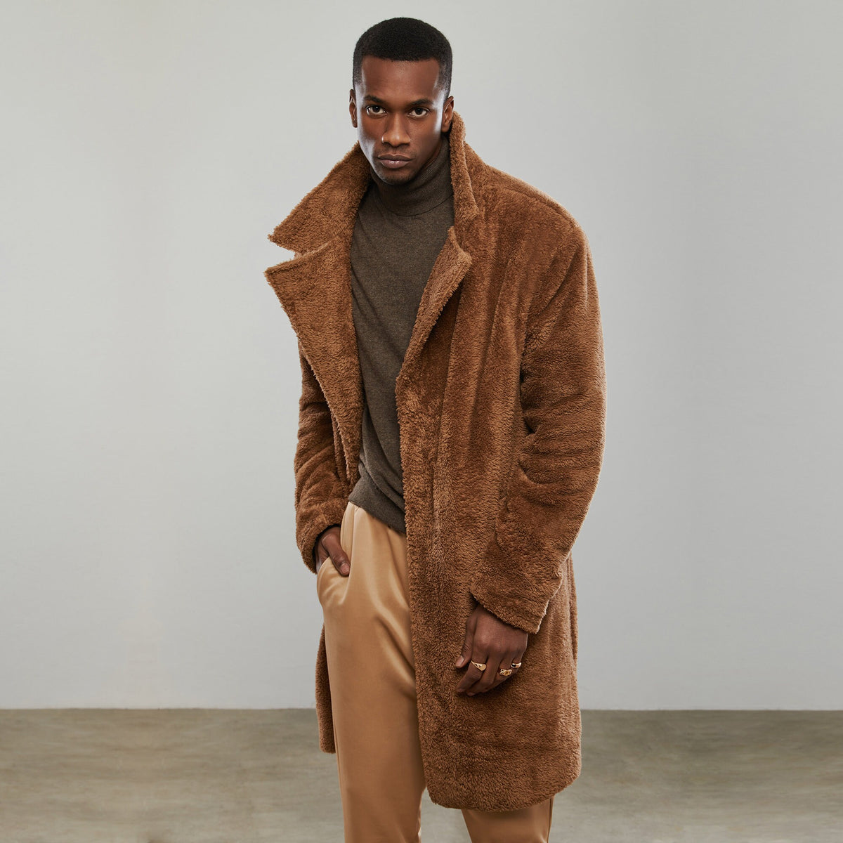Men's long loose fit winter outerwear in camel color with two-button fastening
