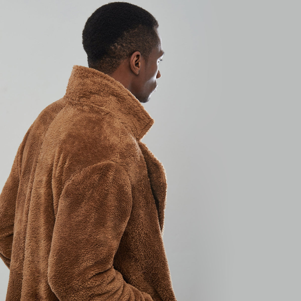 Model wearing size medium camel teddy coat height 1.88m chest 96cm