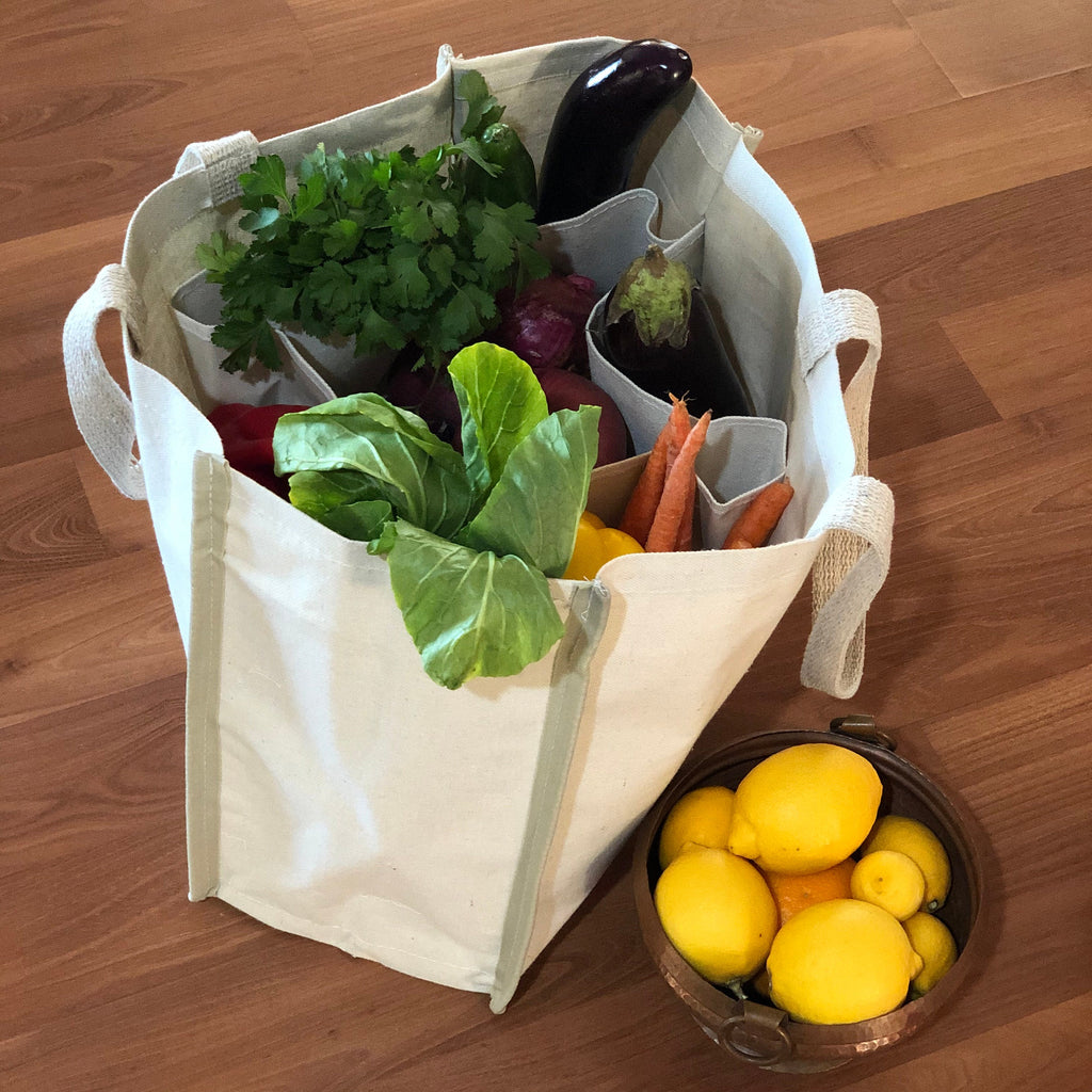 Self-standing grocery bag with 14x16x8 inch dimensions and 12 inch handles