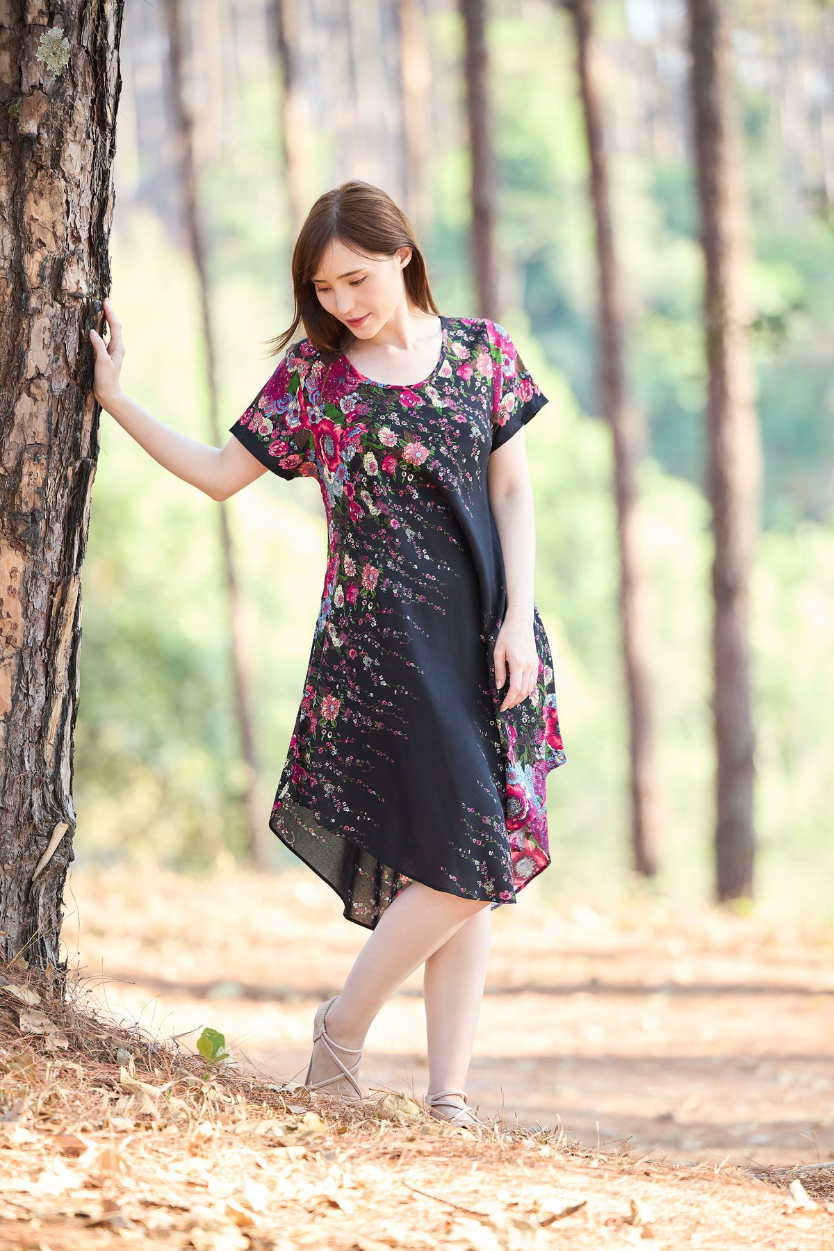 Floral boho rayon sundress with pockets and short sleeves in black print