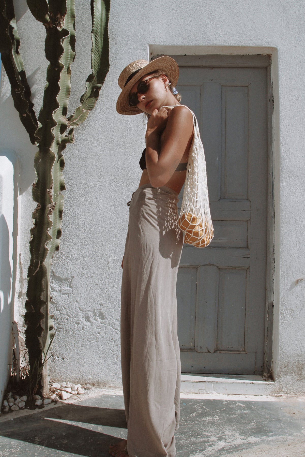 Off white net bag with durable crochet construction, reduces single-use plastic