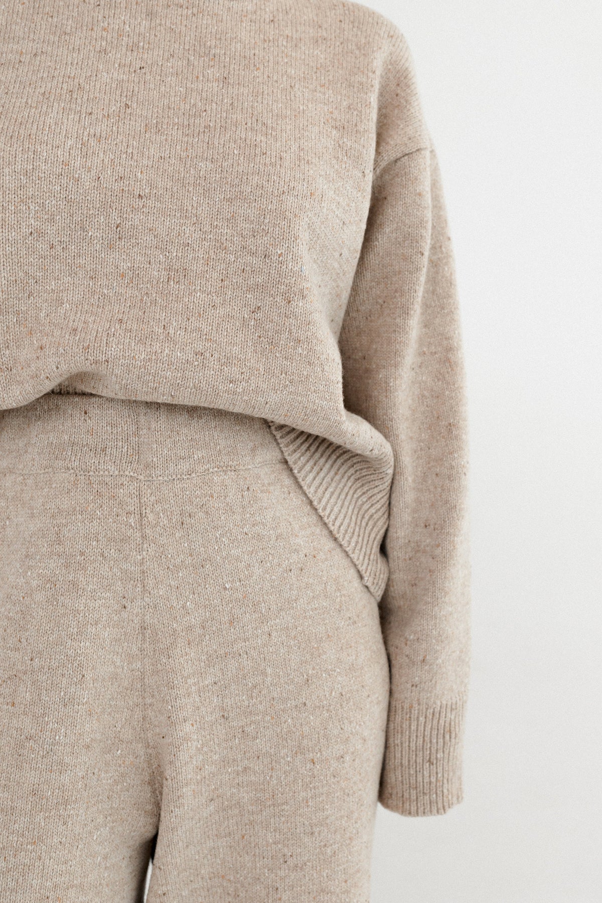 Close-up of tweed structure on wool palazzo pants