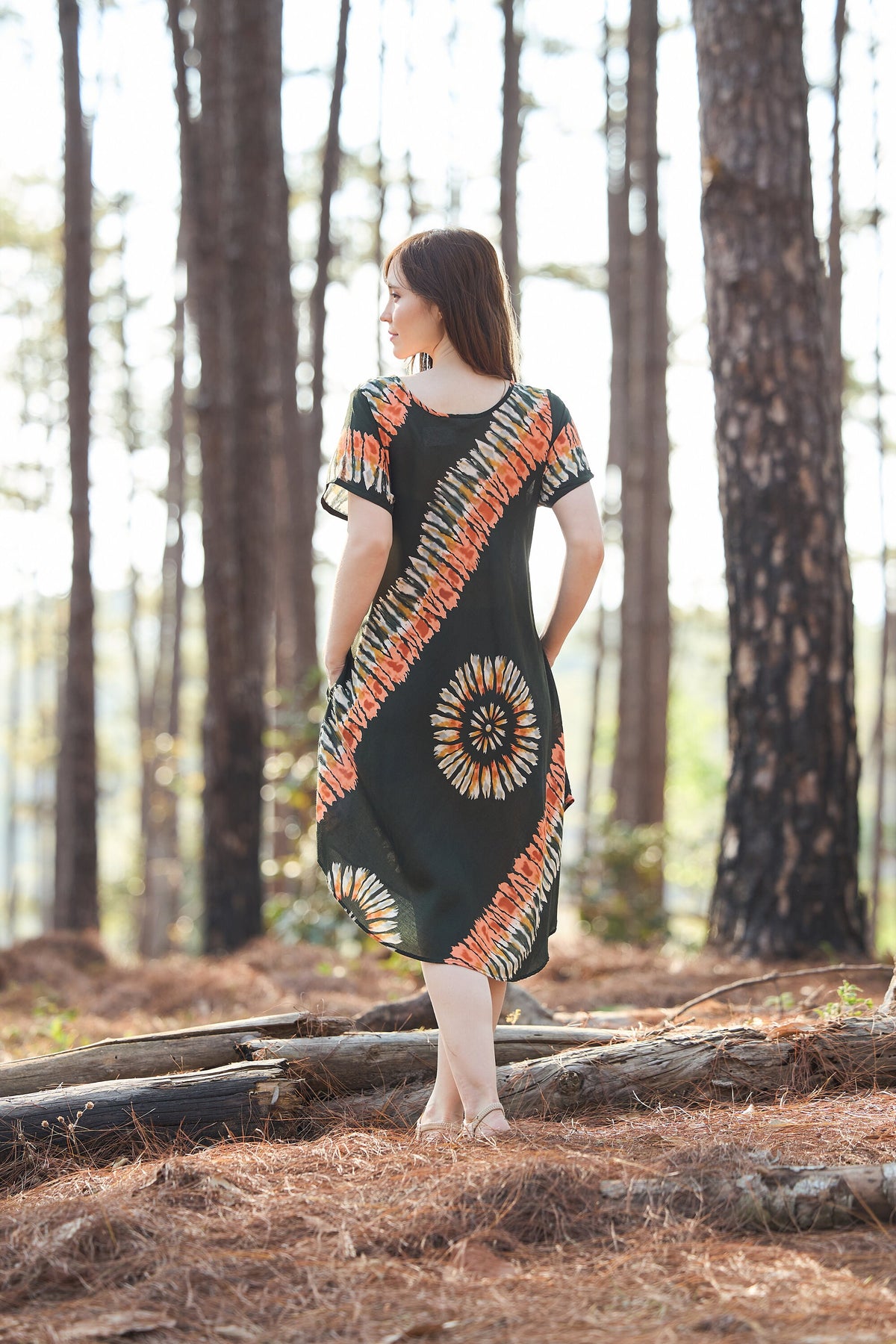 Boho style knee-length dress in green print rayon with pull-on closure