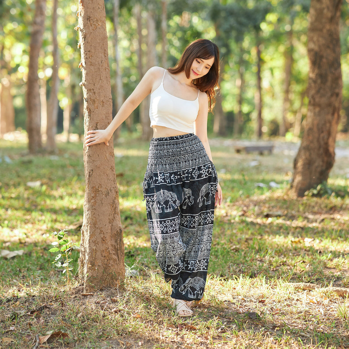 Black elephant print rayon harem pants for boho yoga and lounge