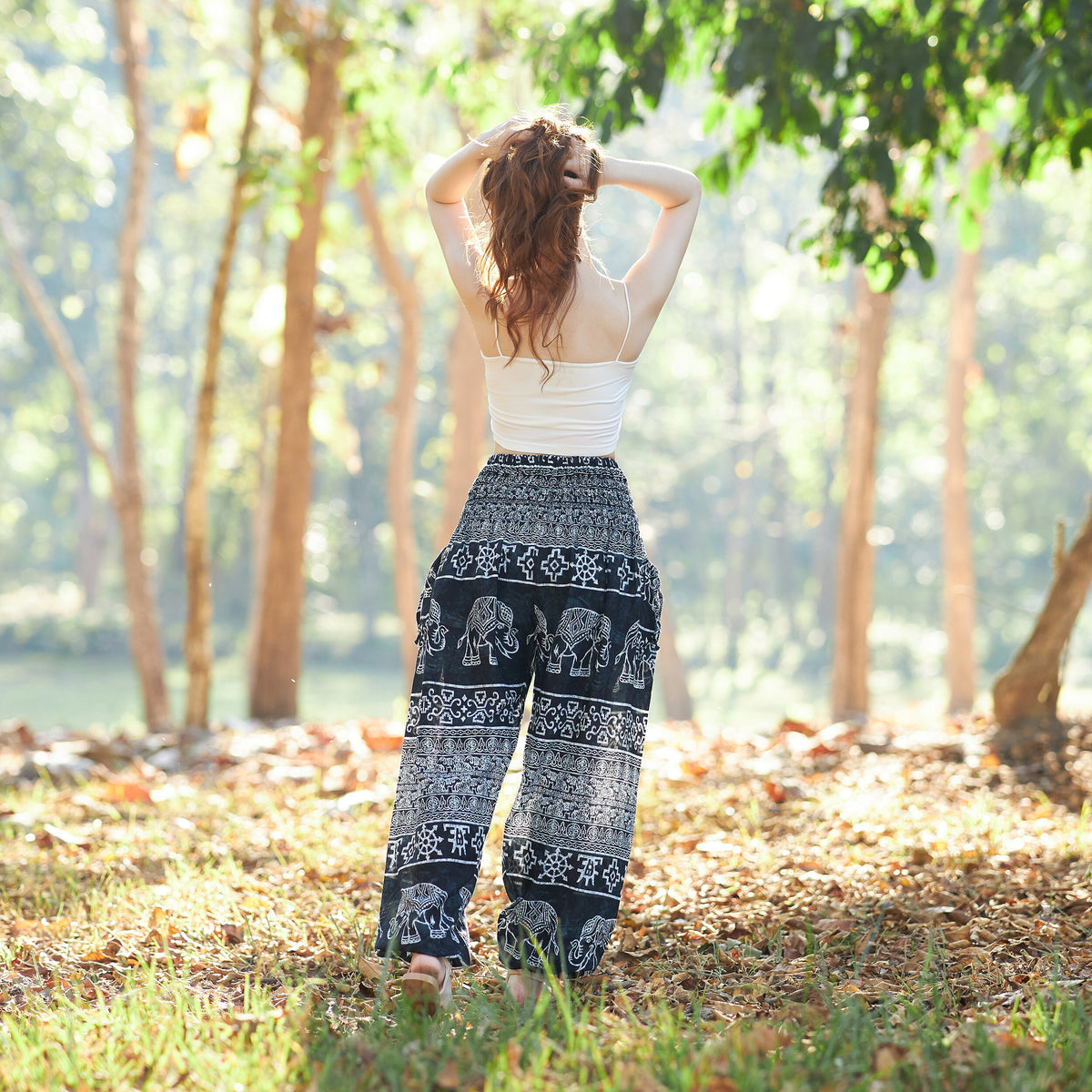 Soft lightweight rayon harem pants in black elephant print