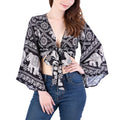 Women's boho wrap blouse styled for summer, soft rayon fabric