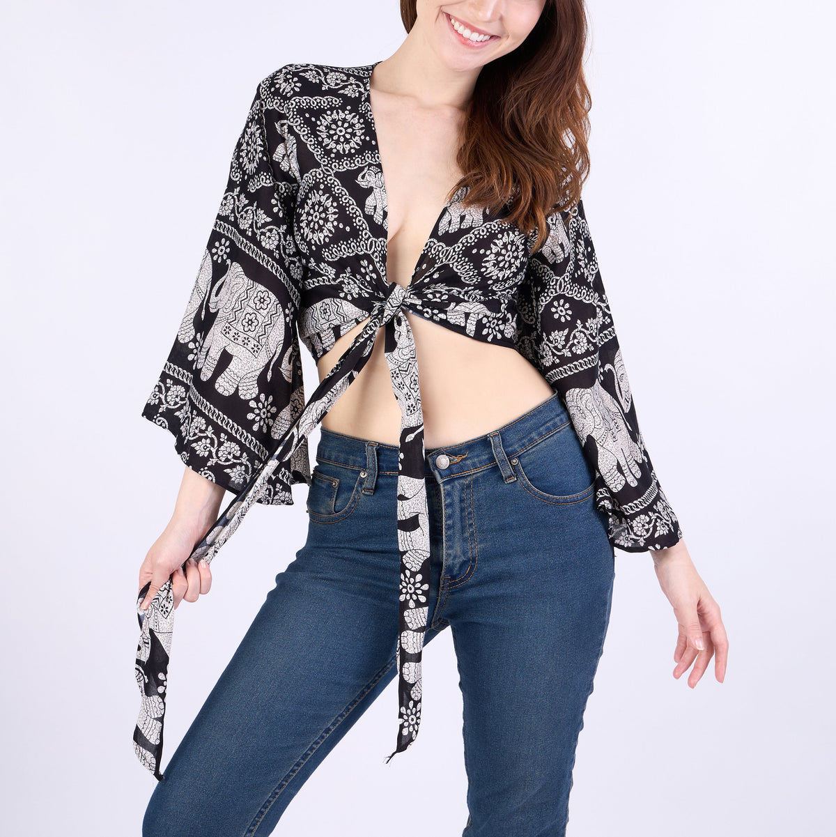 Black rayon wrap top with bell sleeves, perfect for hot weather