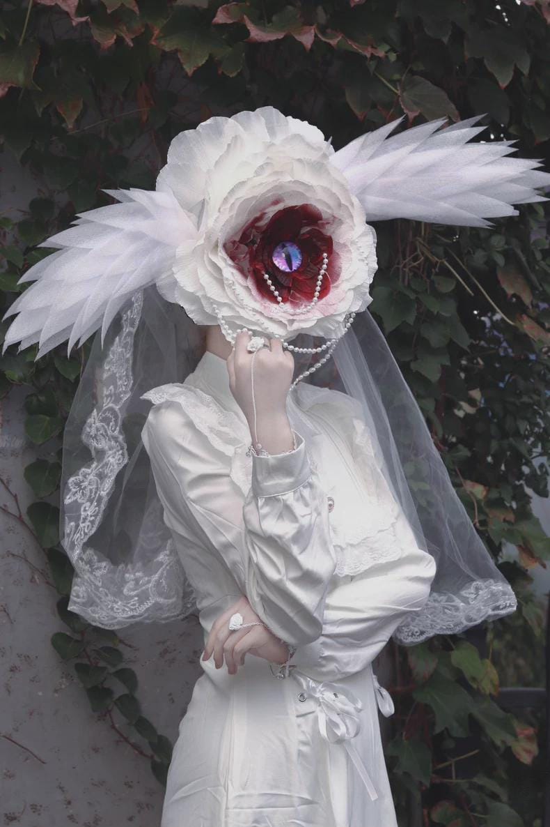 Handmade gothic rose head mask with layered crepe paper petals for cosplay