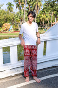 Men's flowy lounge pants with elephant pattern and elastic waist