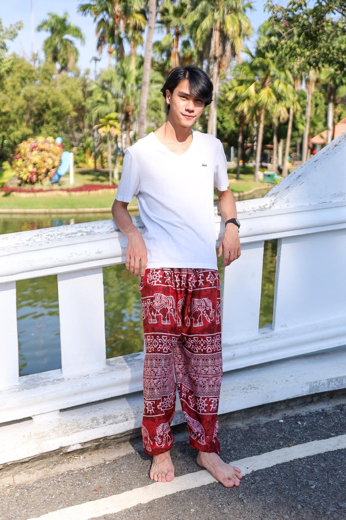 Men's flowy lounge pants with elephant pattern and elastic waist