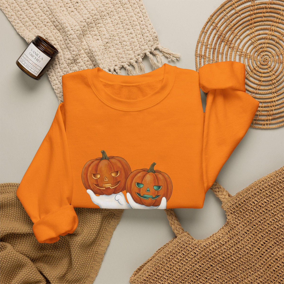 Halloween pullover with tubular knit construction and spooky design