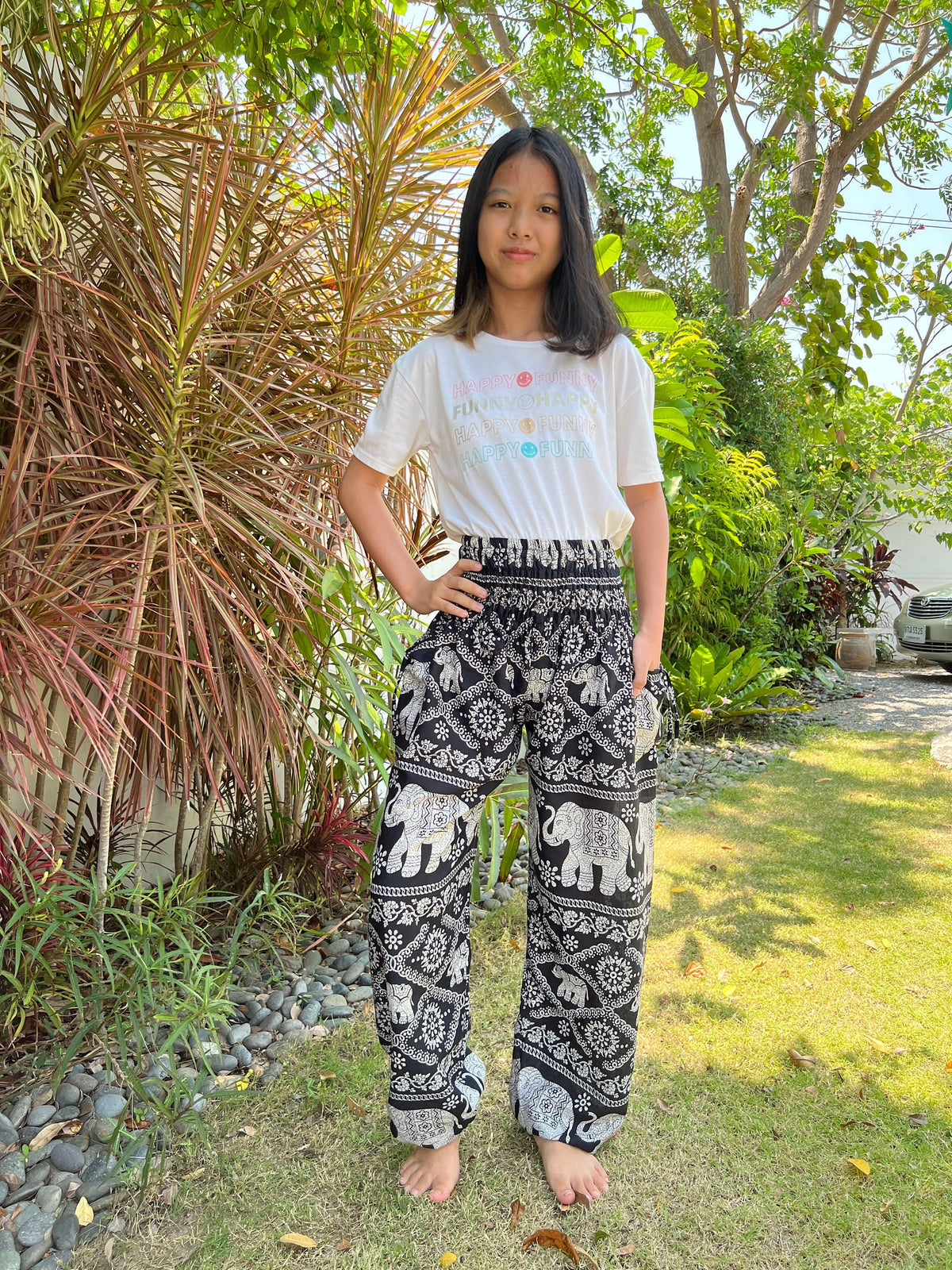 Kids black elephant harem pants with smocked waist and elastic ankles