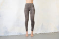 Unisex indigo beige leggings with stretchy fabric and abstract brick pattern