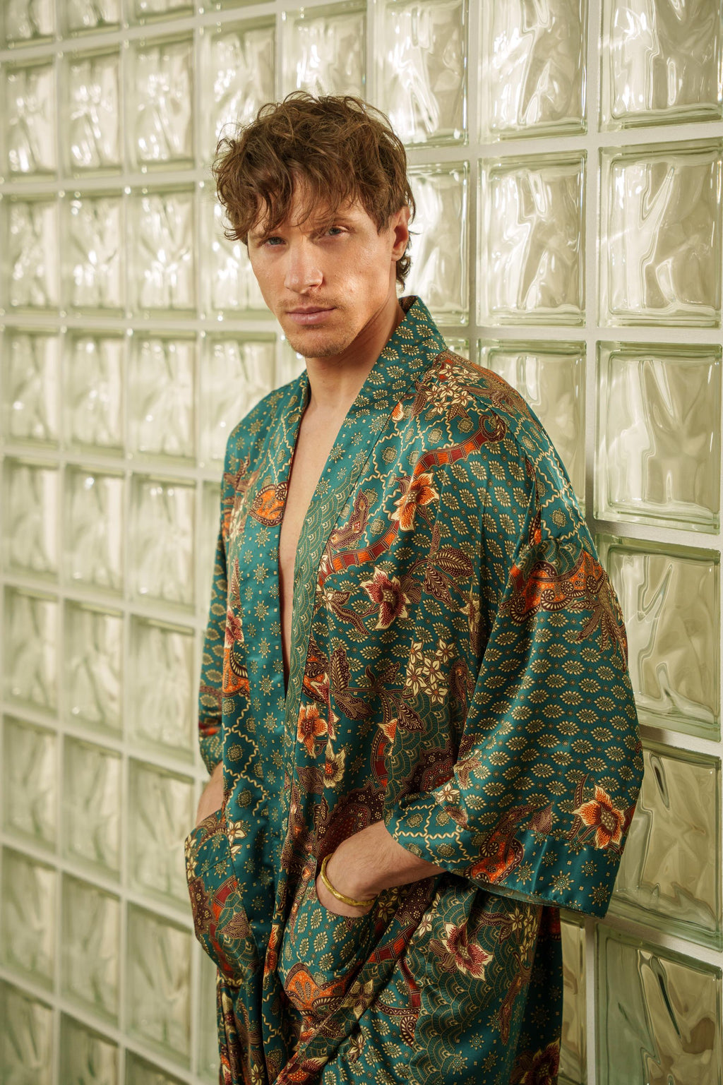 Emerald green men's satin kimono robe with bronze and gold batik-inspired detailing