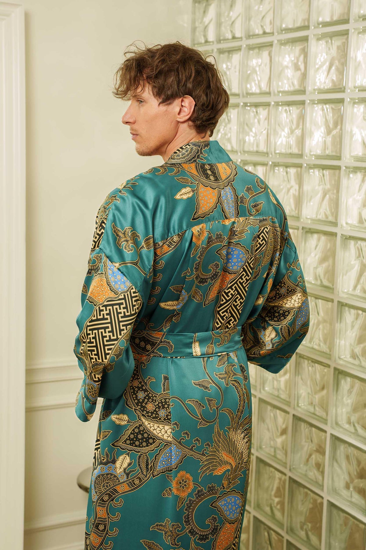 Emerald green satin robe for men, crafted in Indonesia with precise stitching