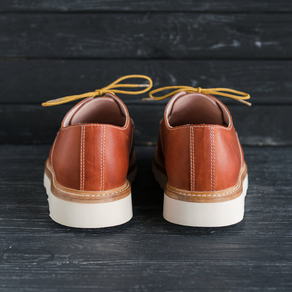 Heritage style handmade leather shoes for men and women in orange waxed leather