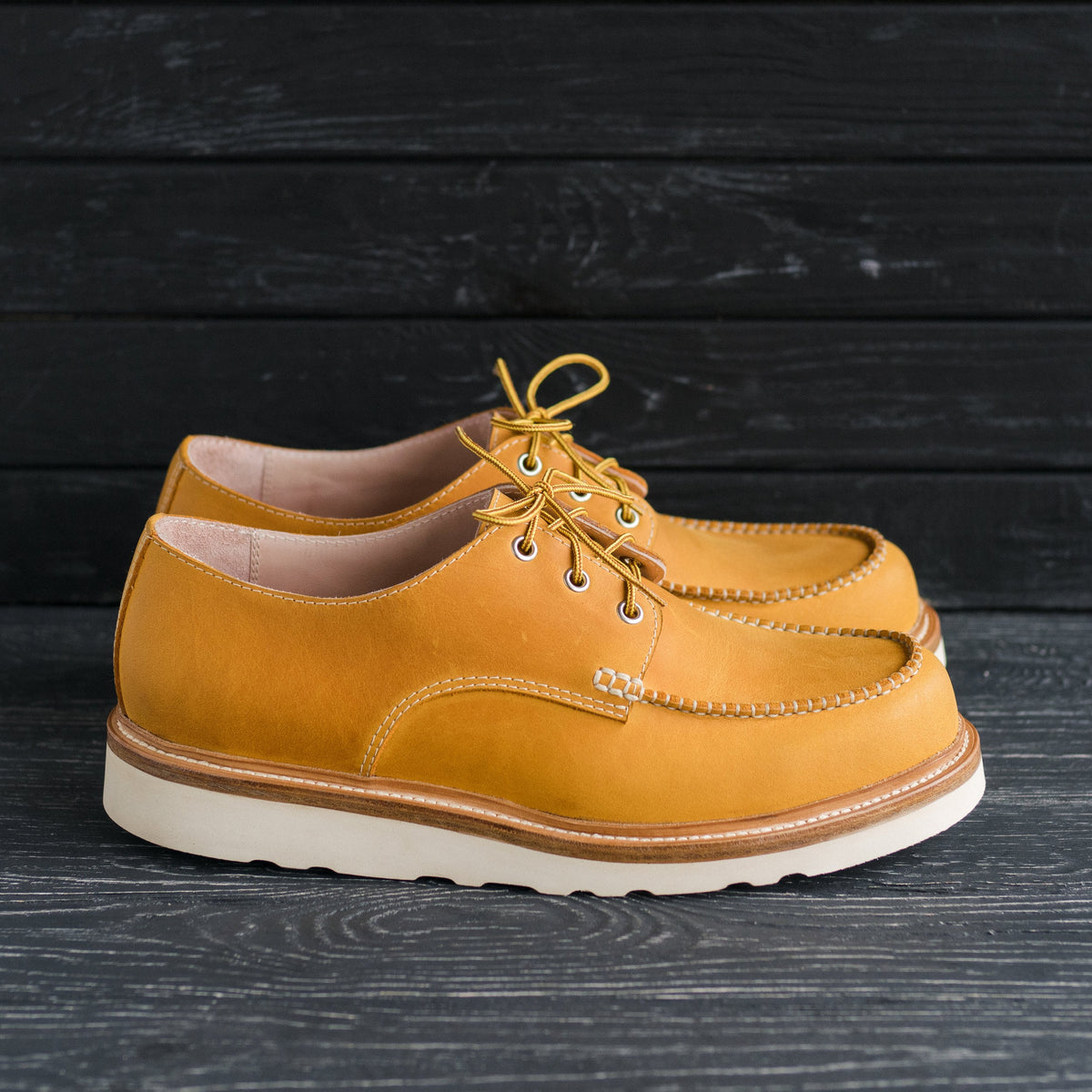 Orange moc toe oxford boots with stainless eyelets and celastic toe box