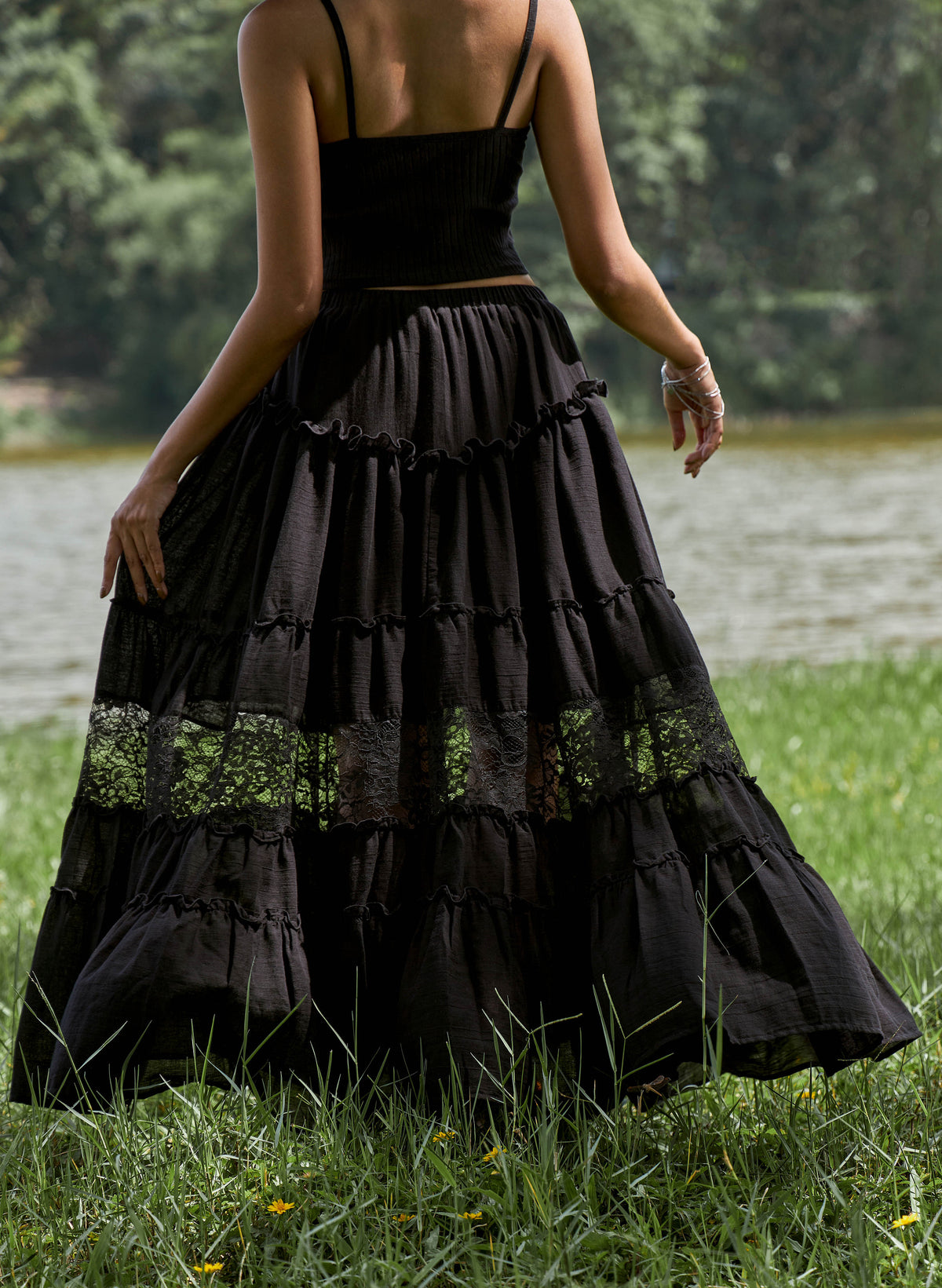 Women's bohemian peasant skirt in black with tiered lace and flare