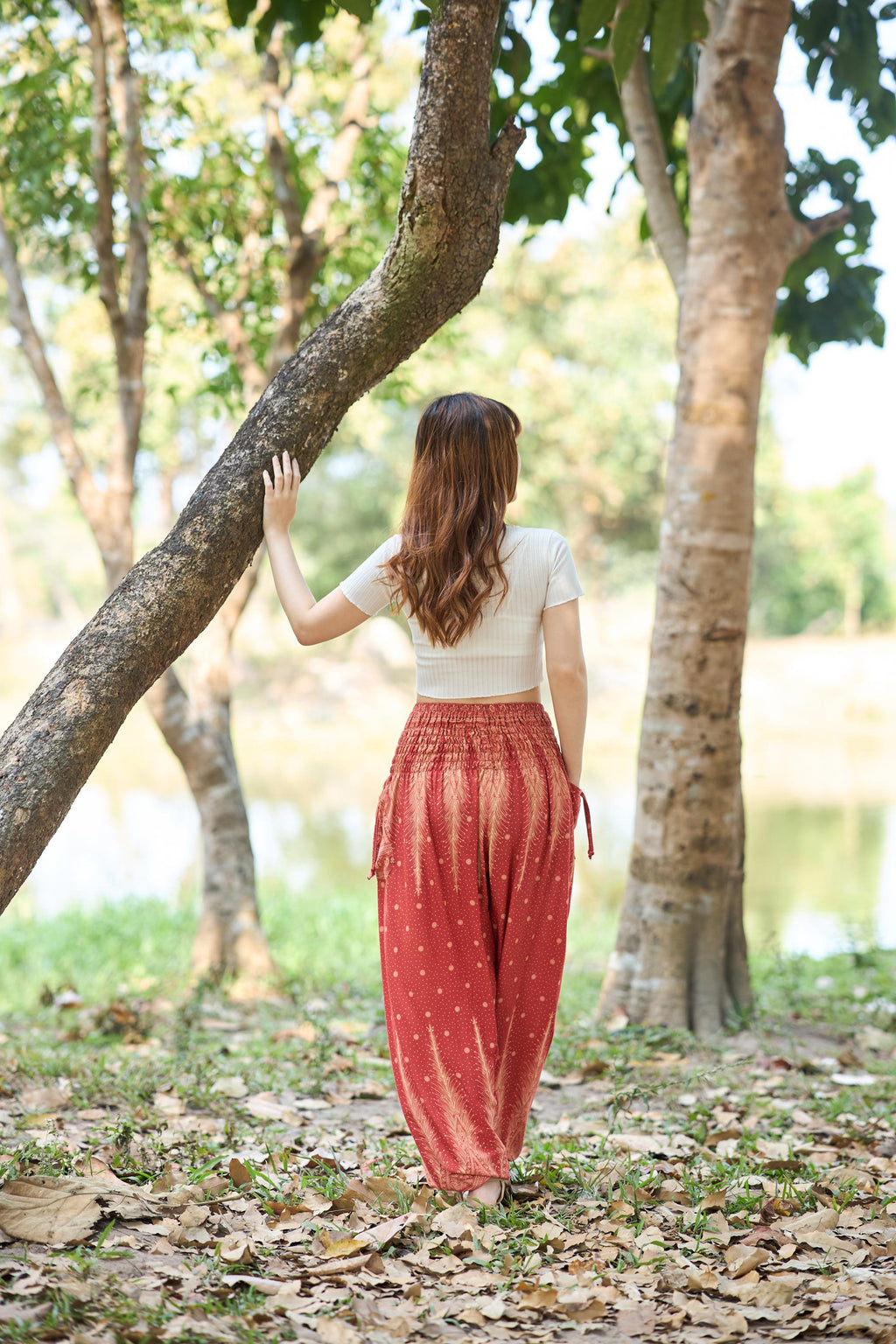 Women's orange peacock pants with relaxed fit and bohemian style