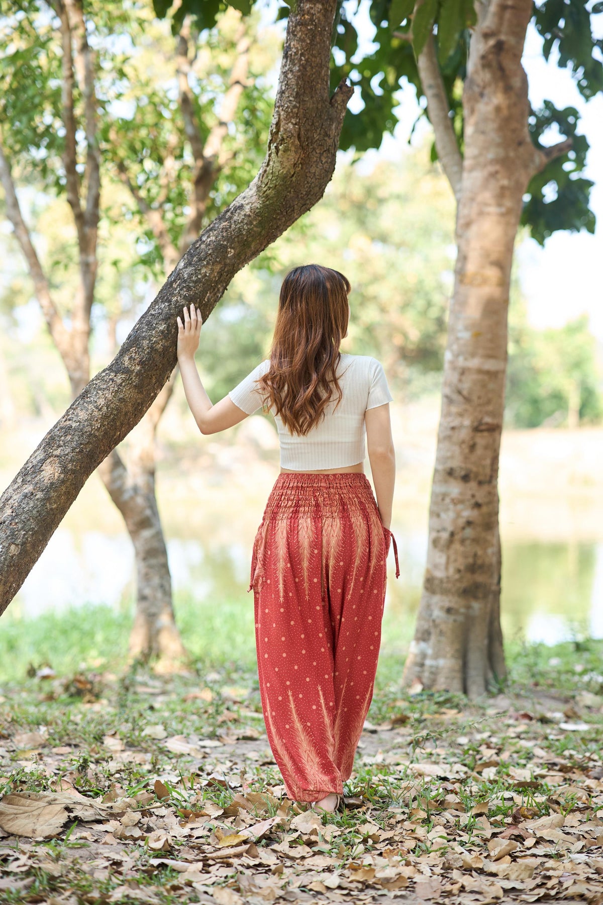 Women's orange peacock pants with relaxed fit and bohemian style