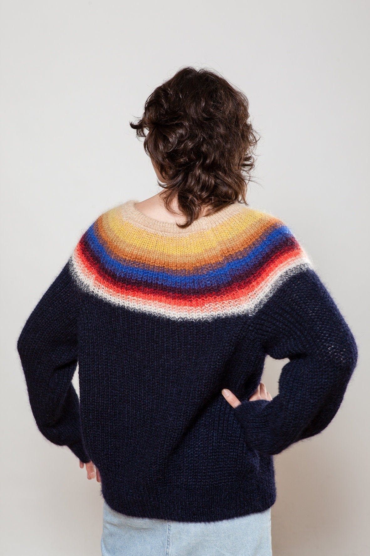 Lightweight rainbow jumper with wide fit, shown on model wearing size M