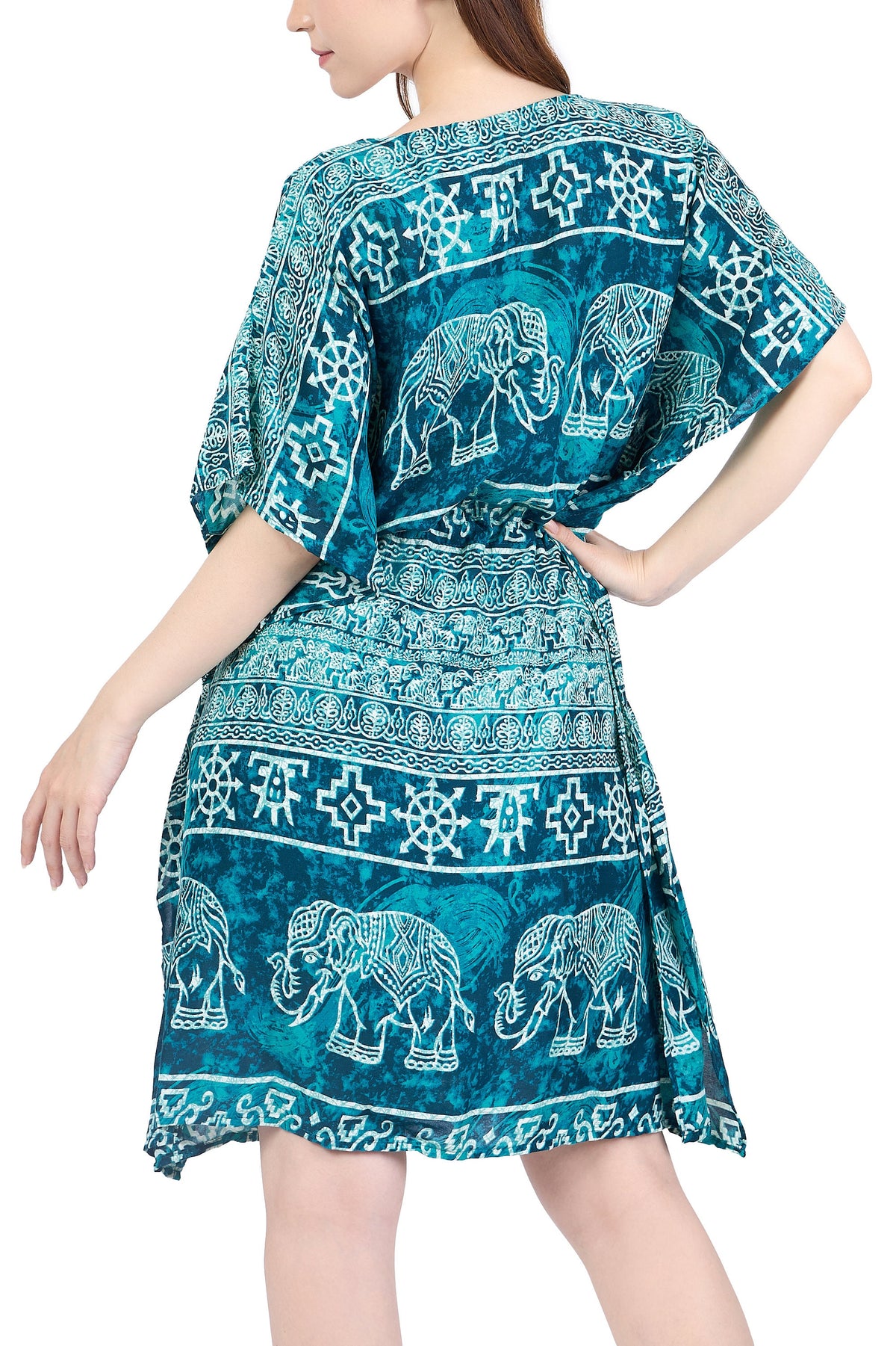 Flowy rayon kaftan dress shown as swimsuit cover-up at the beach