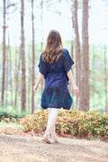 Bohemian tunic dress worn as swimsuit cover-up at the beach