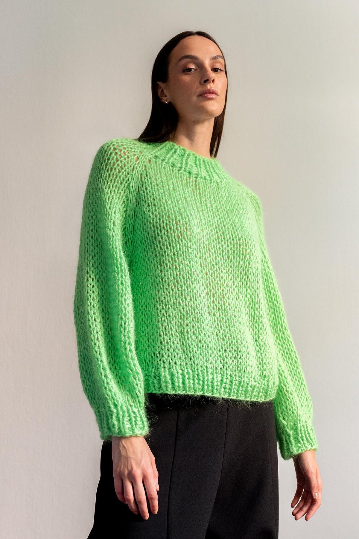 Chunky knit red pullover with slightly cropped length