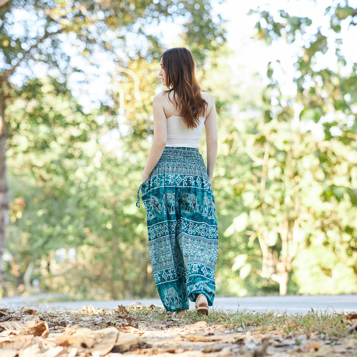 High waist teal harem trousers with elephant print and pockets