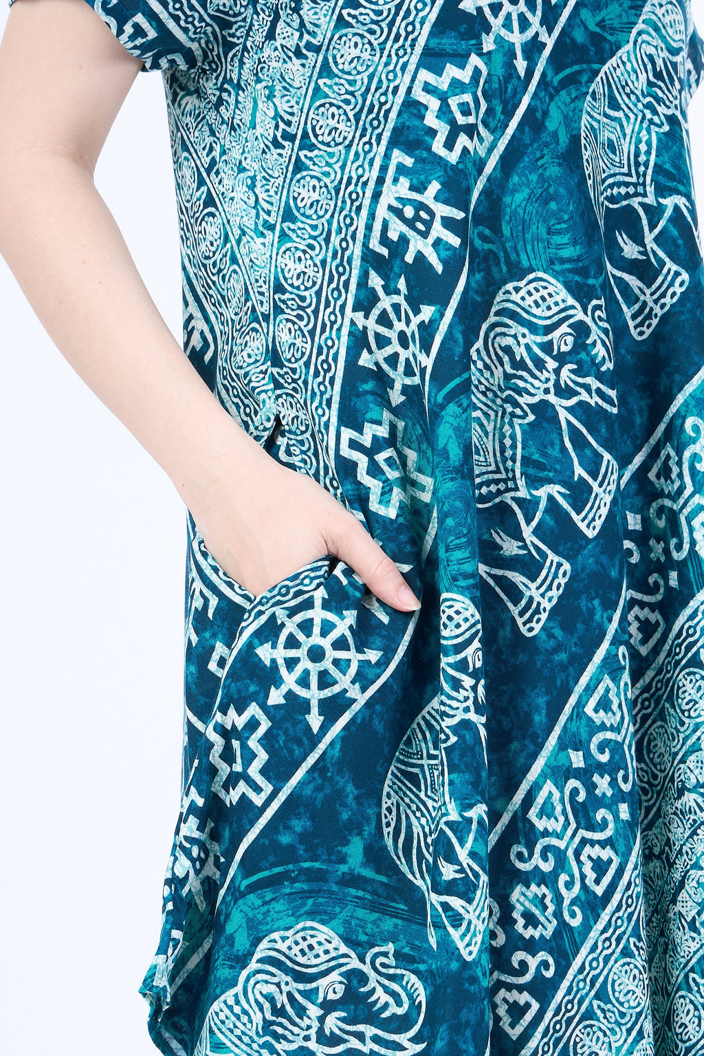 Handmade teal elephant print dress with pull-on closure and side pockets