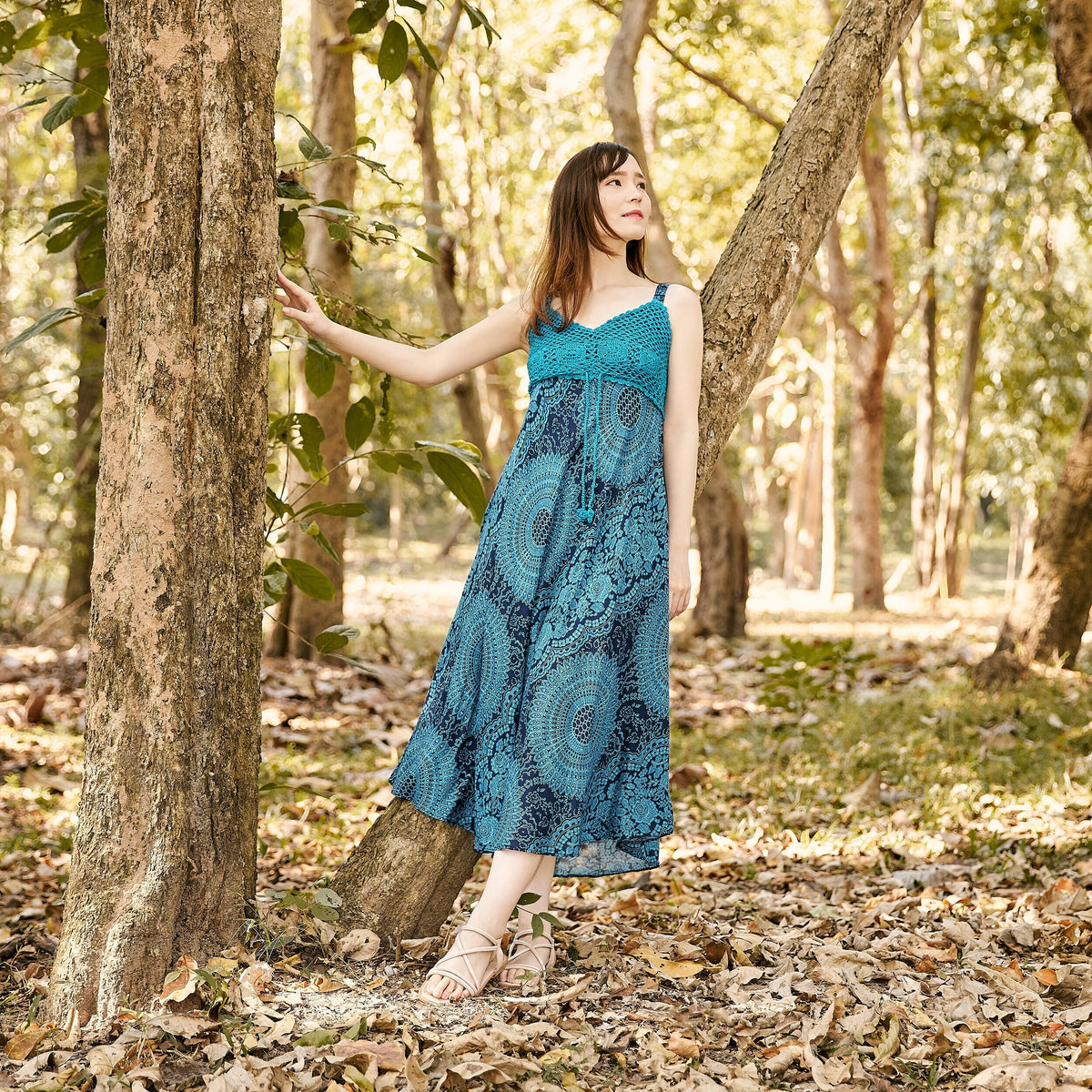 Teal floral crochet top dress with adjustable straps and smocked chest