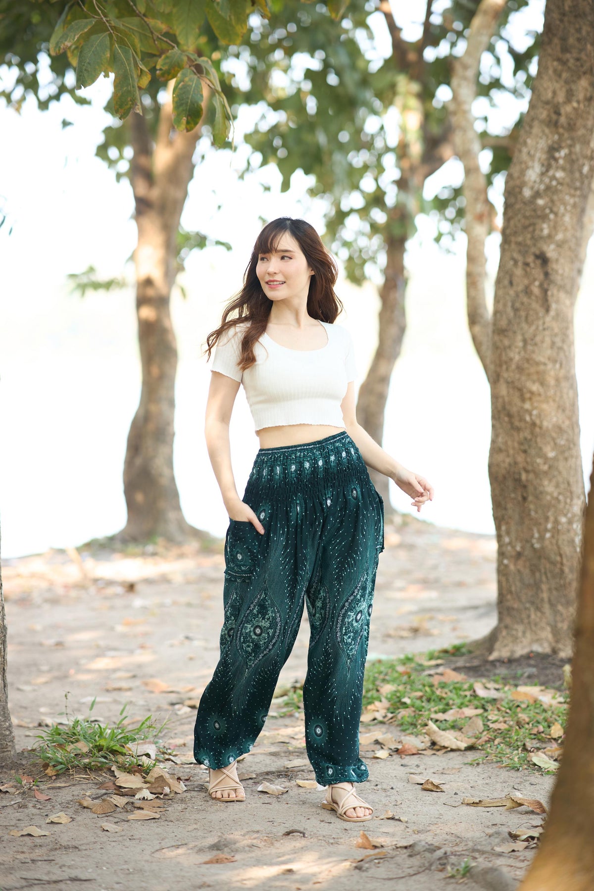 Green Thai harem pants for women with floral boho print and high waist