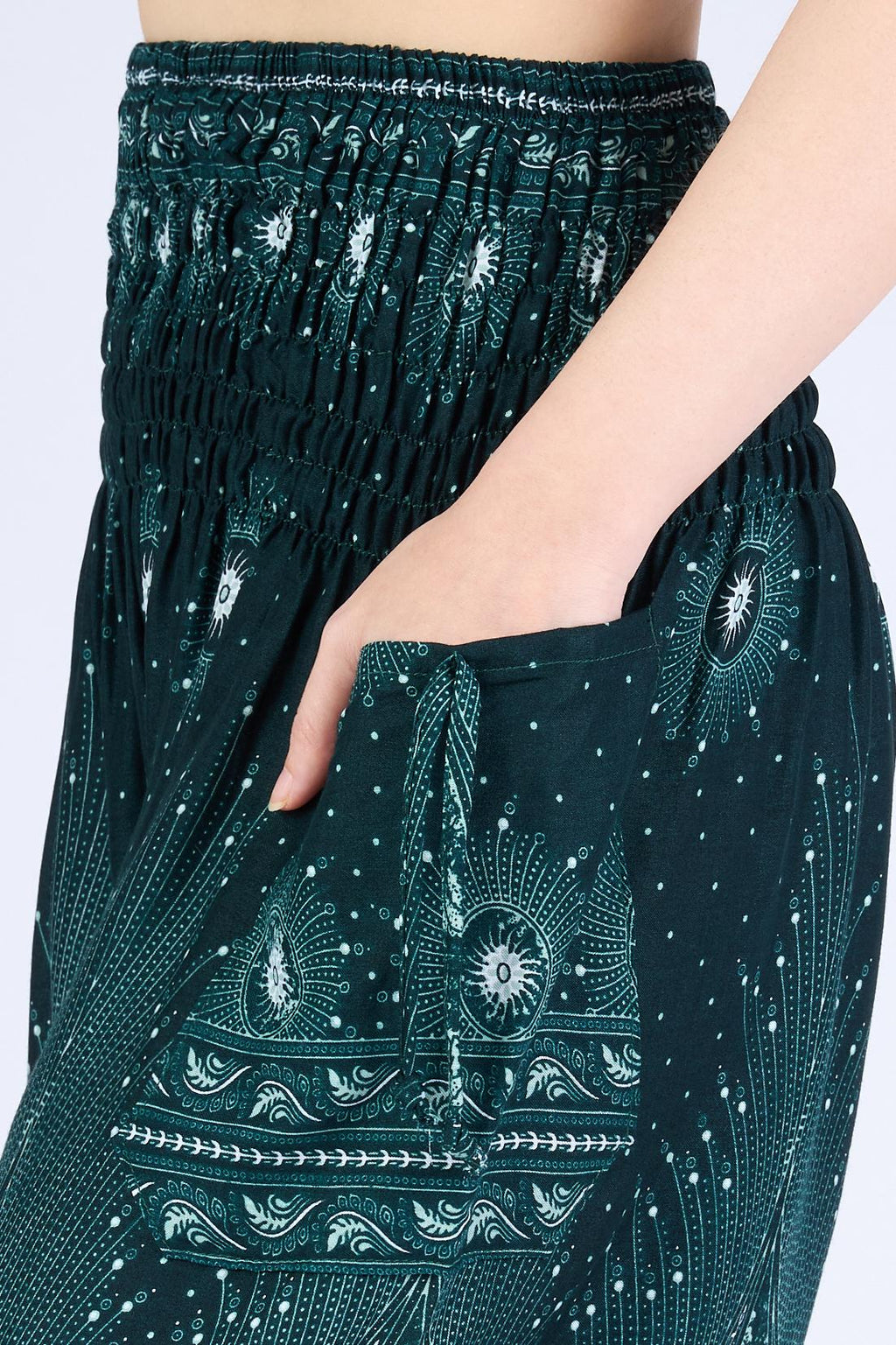 Green boho harem pants with two side pockets and adjustable hips