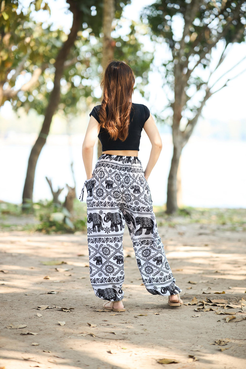 Women's black elephant print yoga pants with elastic ankles